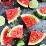 Sprinkle watermelon with Aleppo chili pepper, lime zest, and salt for an icy-cold sweet and spicy treat that's perfect for summer | platingsandpairings.com