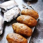 Create a Grilled "Baked" Potato Bar for your next party, potluck or tailgating event. It’s a fun and festive way to feed a crowd, and the topping possibilities are endless. | platingsanpdairings.com