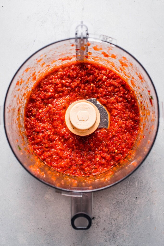 Curry paste in food processor bowl.
