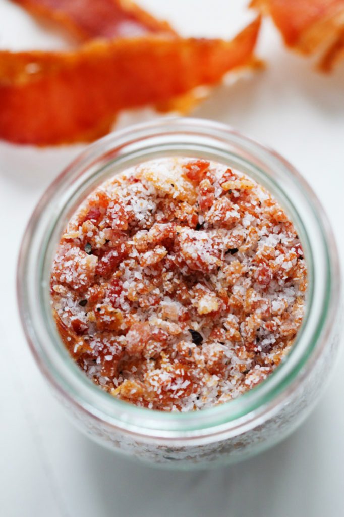 This Homemade Bacon Salt is perfect for sprinkling on popcorn, rimming a Bloody Mary, or finishing off a steak. Plus, it makes a great DIY gift! | platingsandpairings.com