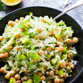 This Fennel and Chickpea Salad is tossed in a light citrus vinaigrette & topped with parmesan. It’s the perfect make-ahead salad for potlucks or lunches. | platingsandpairings.com