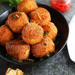 These Pimento Cheese Arancini make a great party appetizer. Creamy risotto & pimento cheese balls are fried until golden & delicious! | platingsandpairings.com