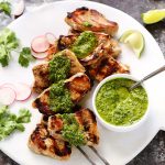 Grilled Pork Medallions with Mojo Sauce is a quick & easy weeknight dinner idea. Tender pork pieces are quick grilled & topped with a spicy Cuban mojo sauce. | platingsandpairings.com
