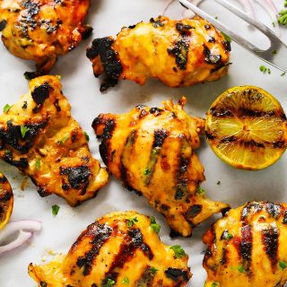 Mango Lime Grilled Chicken features a sweet and spicy mango lime marinade that caramelizes perfectly on a hot grill. It's perfect for your summer BBQ. | platingsandpairings.com