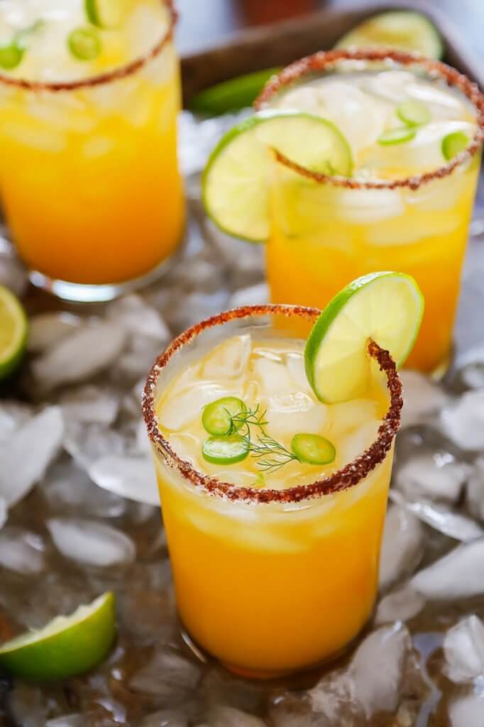 This Mango Michelada is a Mexican beer cocktail that’s sweet and spicy and perfect for summer sipping! | platingsandpairings.com