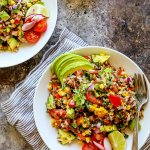 Lentil & Brown Rice Salad has a Southwestern flair with grilled corn, tomatoes, avocado and a tangy lime and cilantro dressing. It's a healthy, protein & fiber-filled meal that’s perfect for lunch or dinner. | platingsandpairings.com