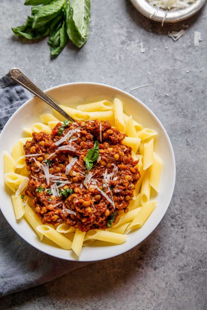 Instant Pot Lentil Bolognese Sauce can be made in no time with the help of your electric pressure cooker. It's vegetarian and packed with protein & fiber. 