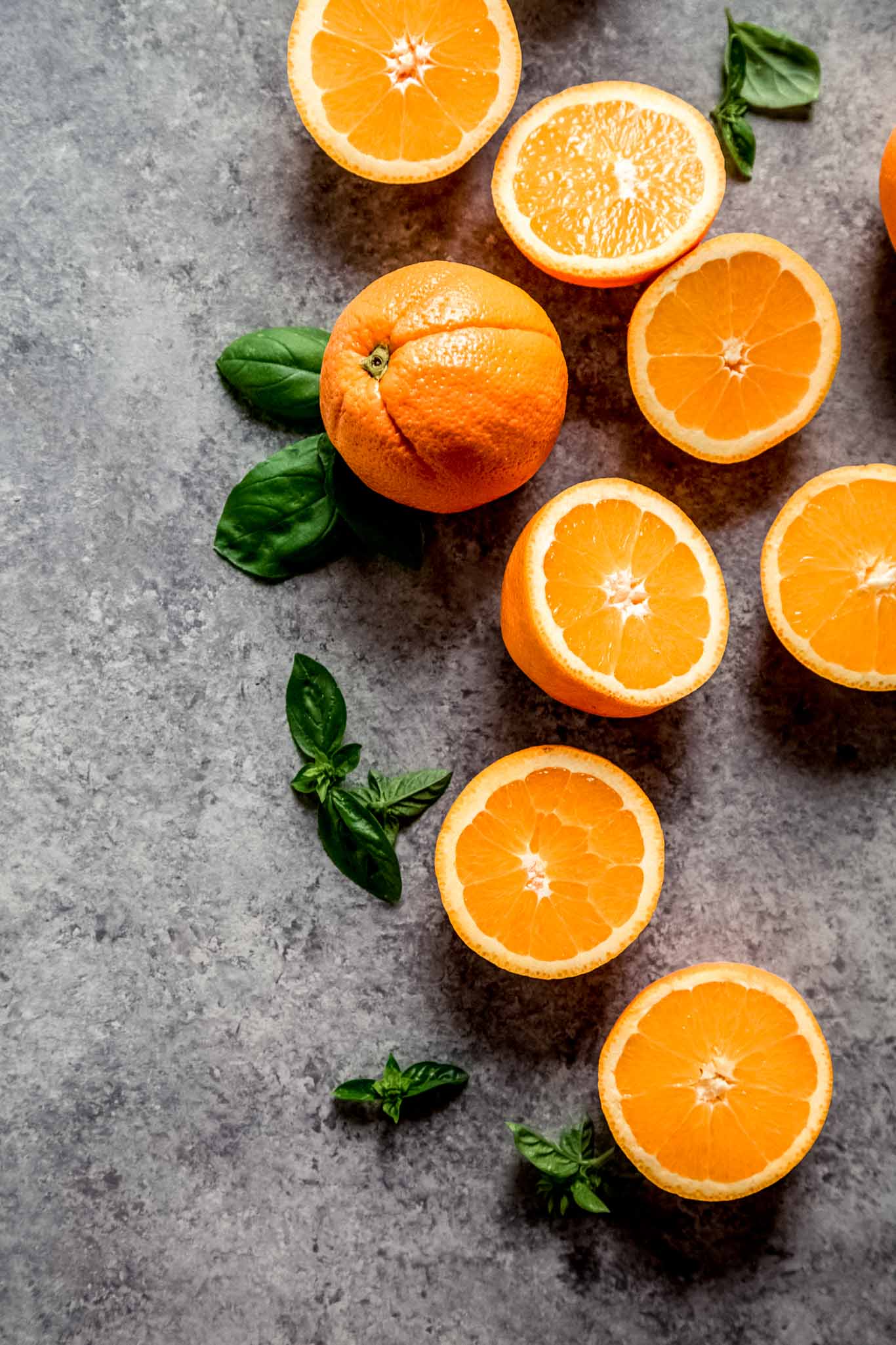 Oranges on concrete counter.