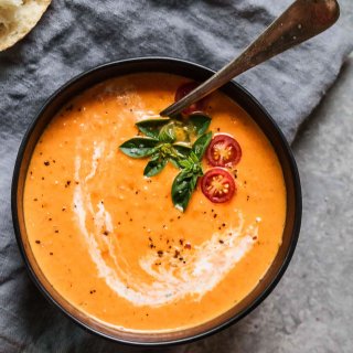 Tomato Orange Soup is the creamiest tomato soup recipe you will find. Plus, it's got a great tang for the orange juice. It's the perfect winter soup for chilly days.