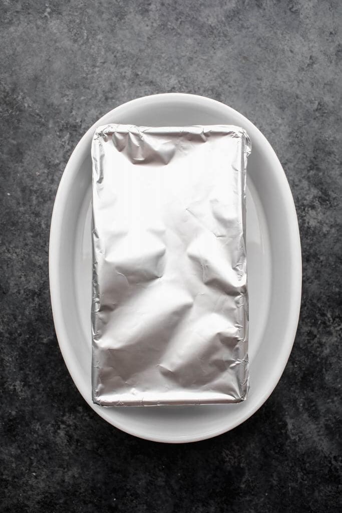 Loaf pan in water bath.