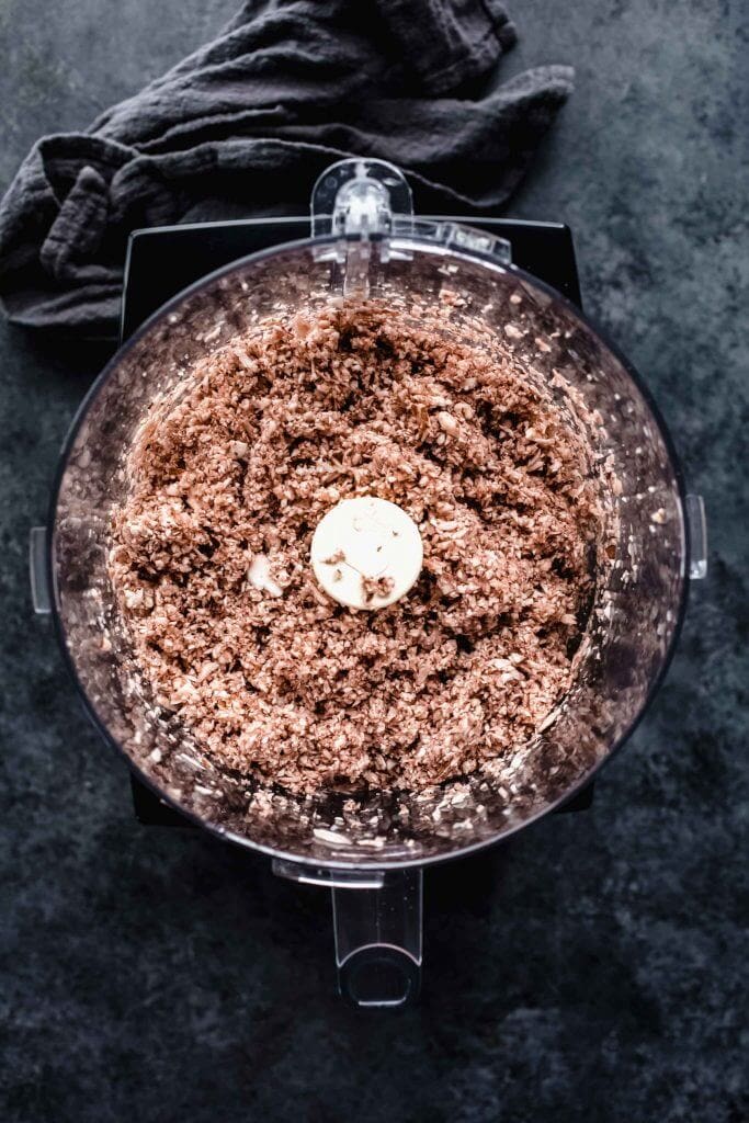 Chopped mushrooms in food processor.