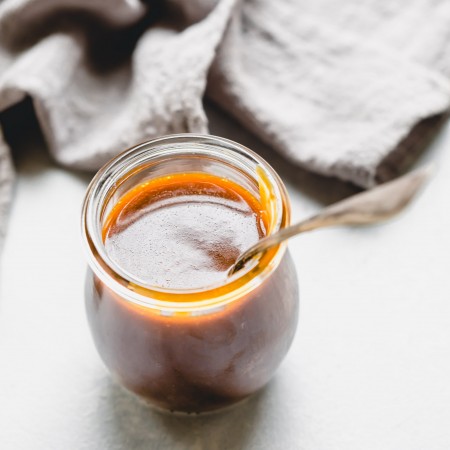 Salted caramel sauce in small weck jar.