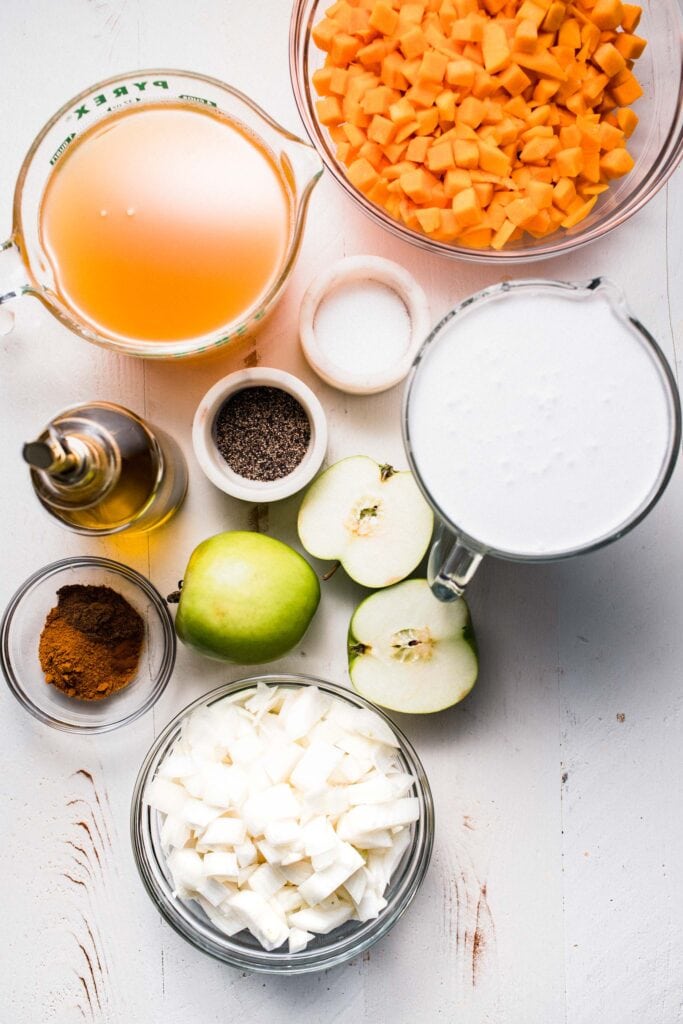 Ingredients for curry butternut soup on counter.