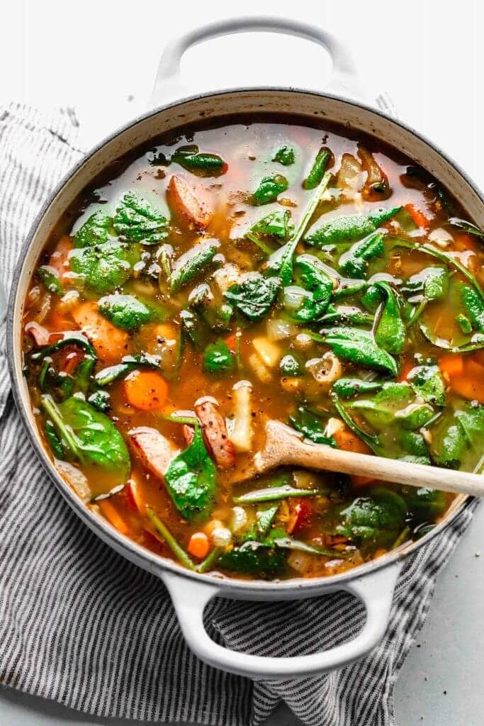 Kielbasa soup in pot.