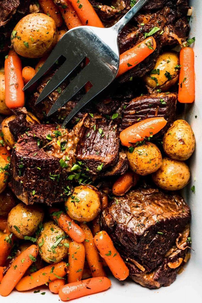 Overhead close up of instant pot pot roast in serving dish.