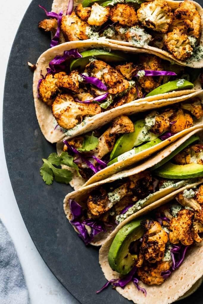 Plate of assembled cauliflower tacos