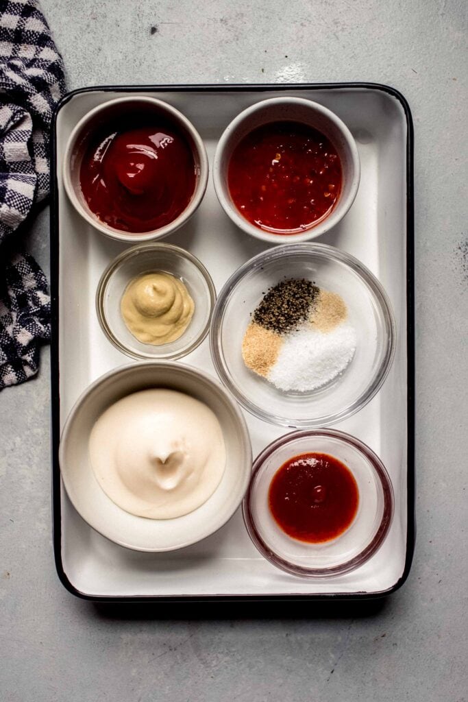 Ingredients for boom boom sauce on tray.