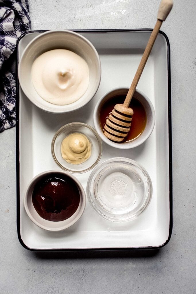 Ingredients for chick fil a sauce on tray.