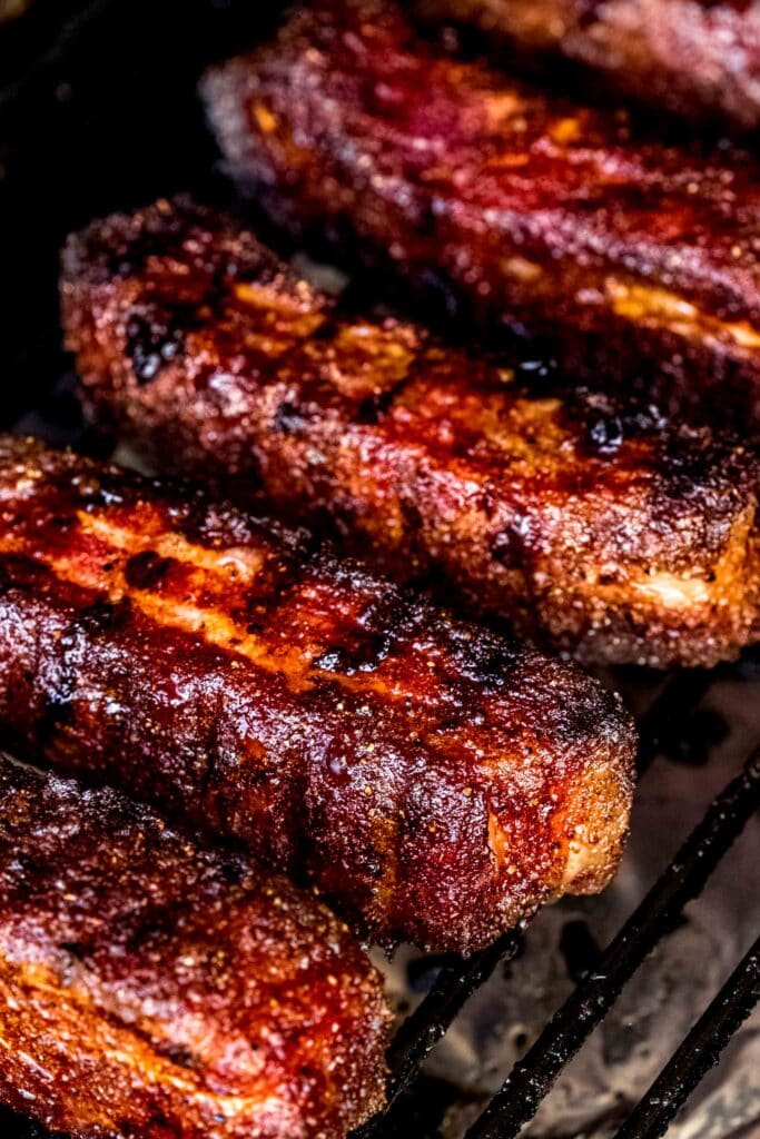 Pork belly strips on smoker.