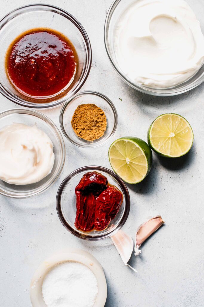 Baja sauce ingredients on counter.