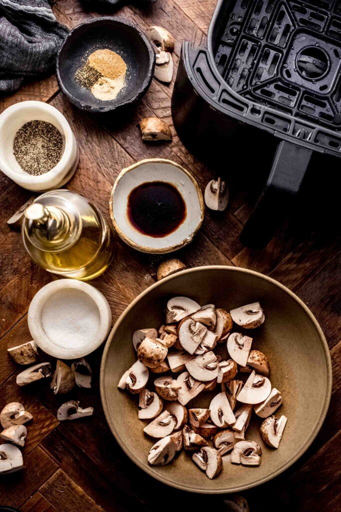 Ingredients for air fried mushrooms on counter.