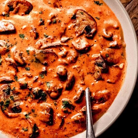 Jaeger sauce in bowl with spoon.