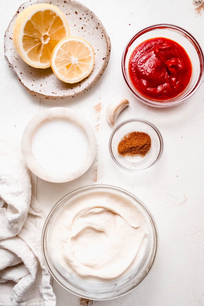 Sriracha mayo ingredients on counter.