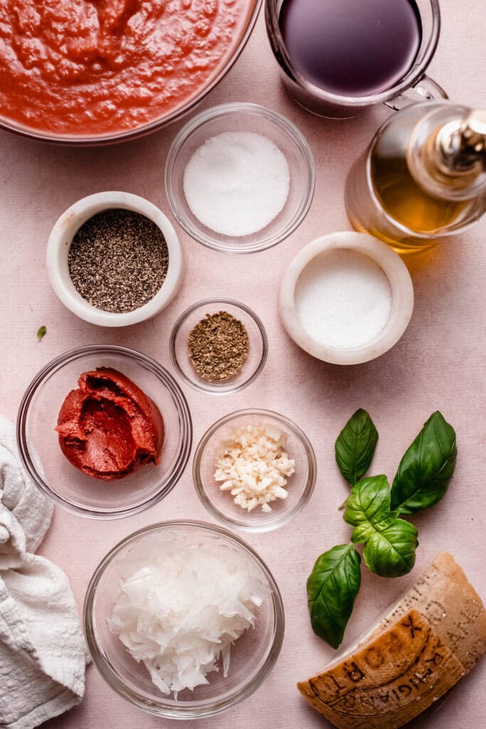 Ingredients for red wine pasta sauce on counter.