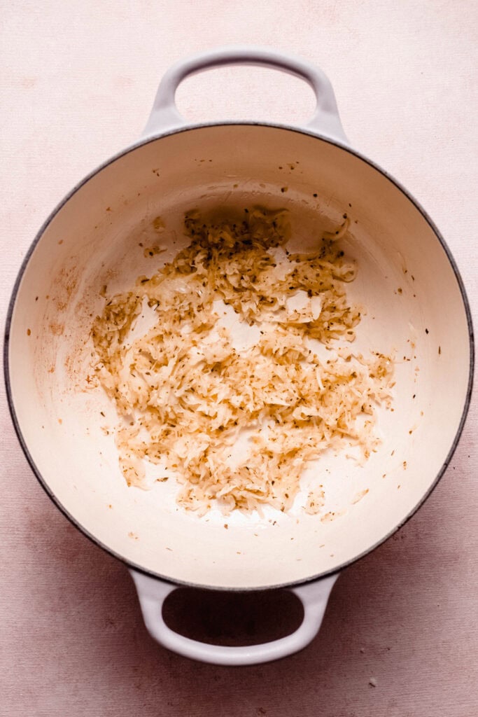 Sauteed onions and garlic in pot.