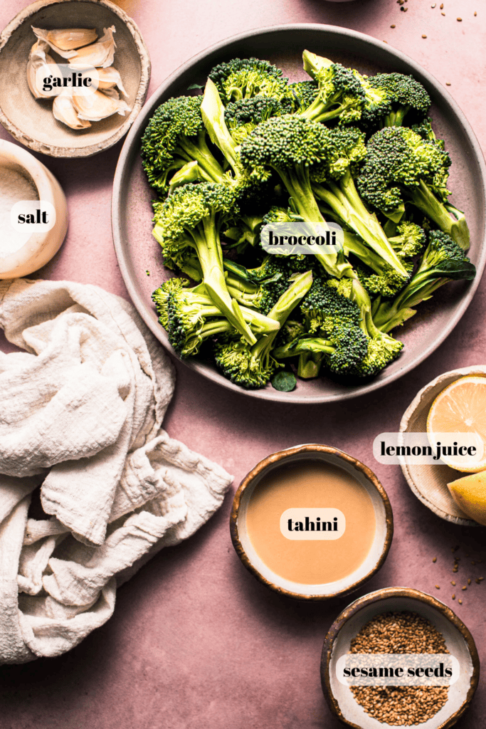 Ingredients for broccoli with basil tahini labeled on counter.