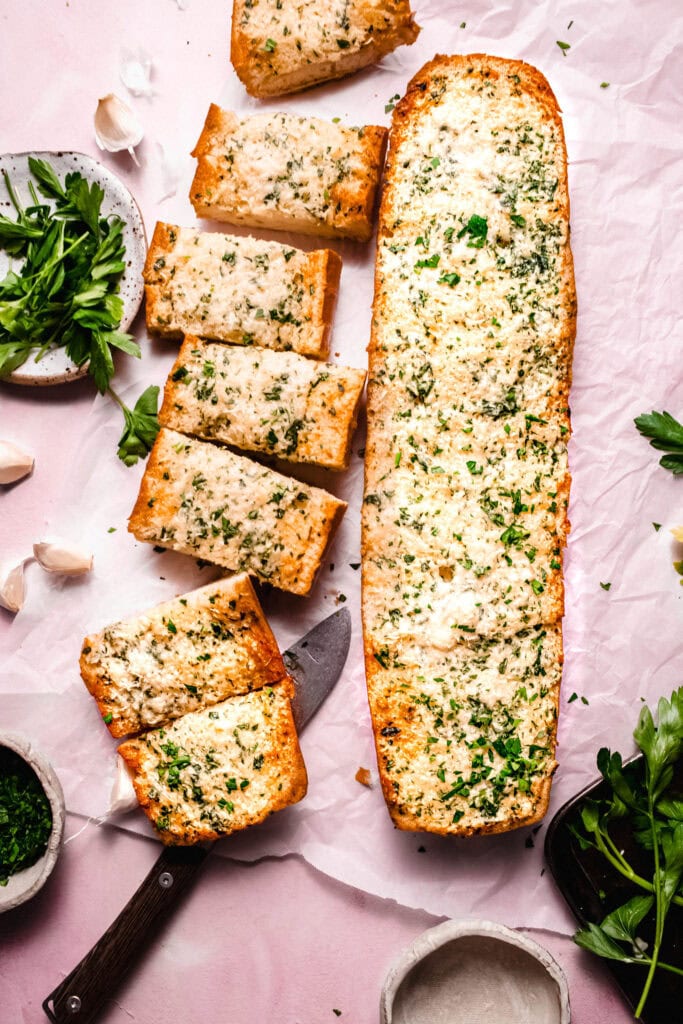 Cheesy garlic bread sliced and ready to enjoy.