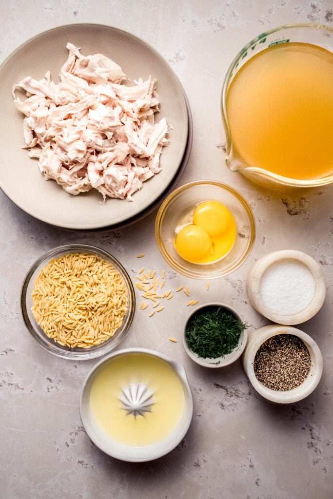 Ingredients for avgolemono soup on counter.