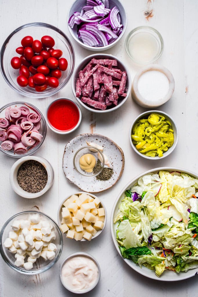Ingredients for italian chopped salad on counter.