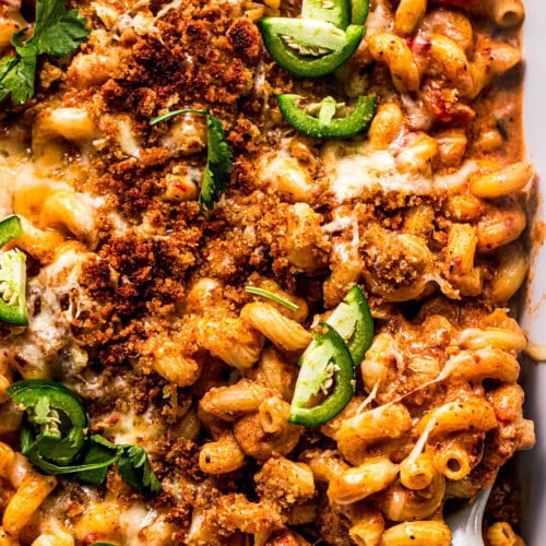 Overhead close up of chorizo mac and cheese in casserole dish.