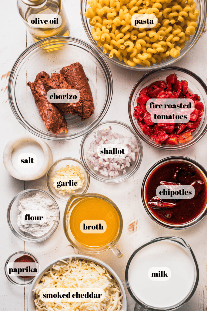 Ingredients for chorizo mac and cheese labeled on counter.