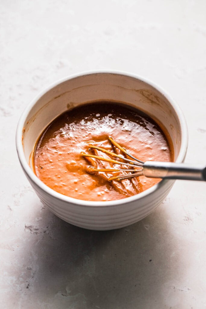 Thai peanut sauce mixed together in bowl.