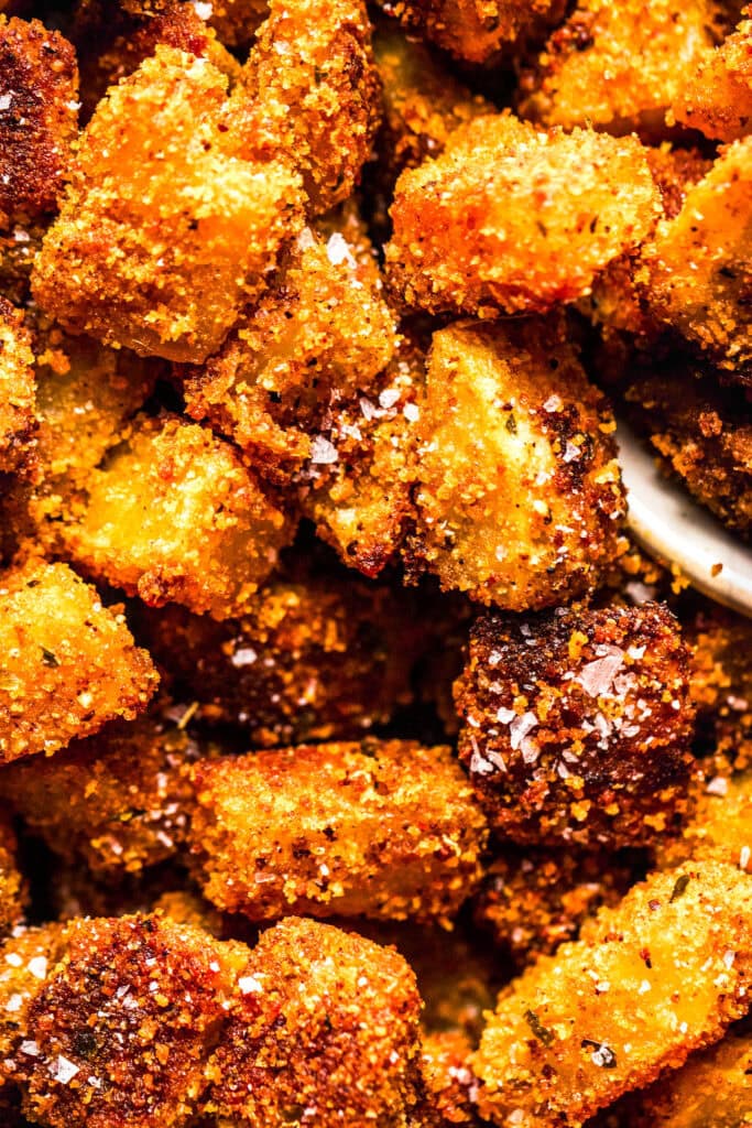 Overhead close up of crispy shake n bake potatoes.