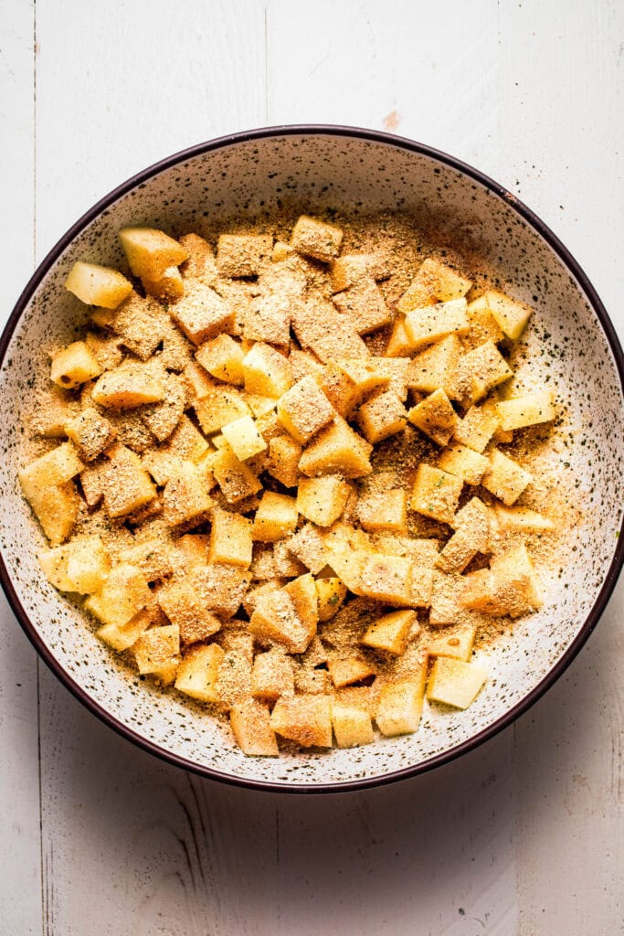 Potatoes tossed with spices.