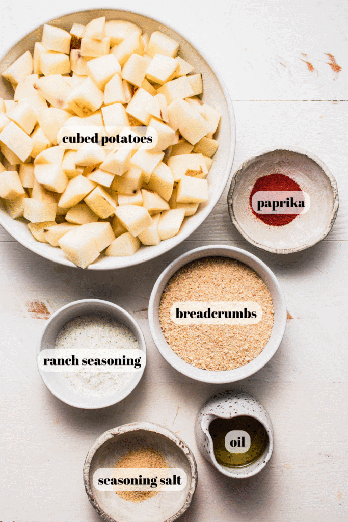 Ingredients for shake n bake potatoes labeled on counter.