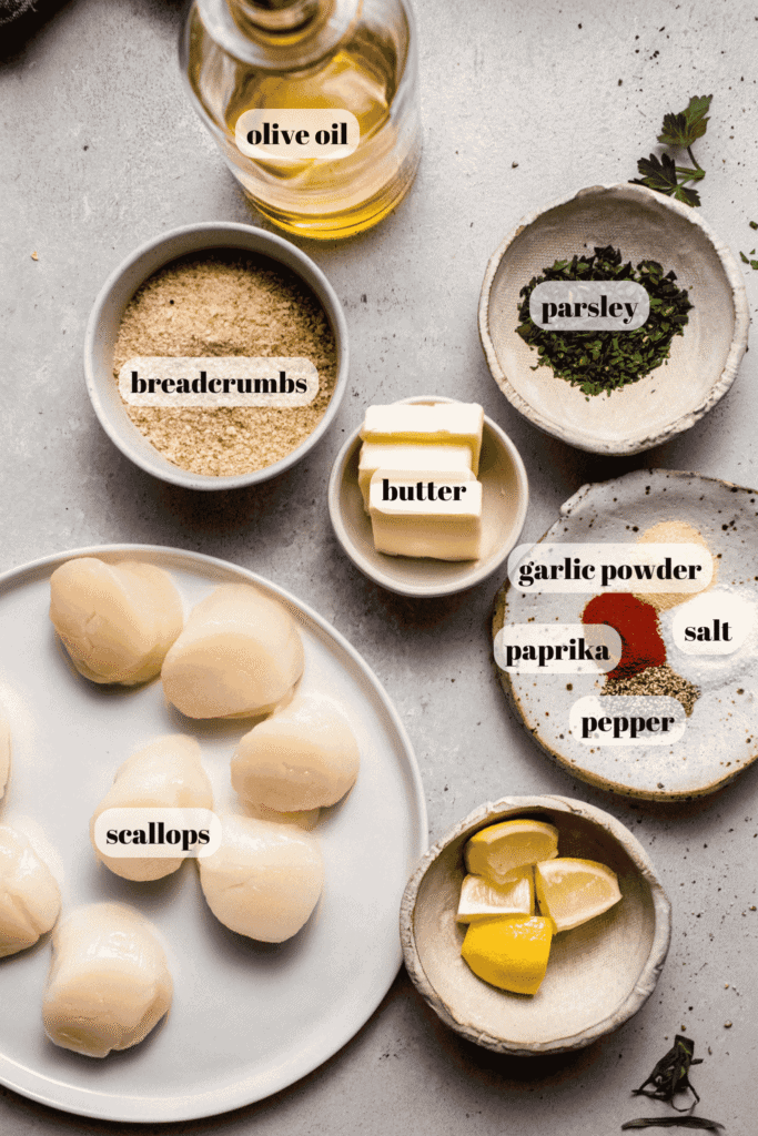Ingredients for air fryer panko scallops labeled on counter.