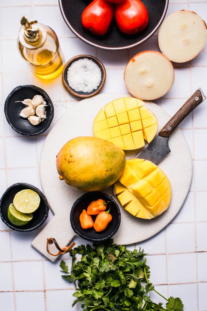 Ingredients for mango habanero salsa on counter.