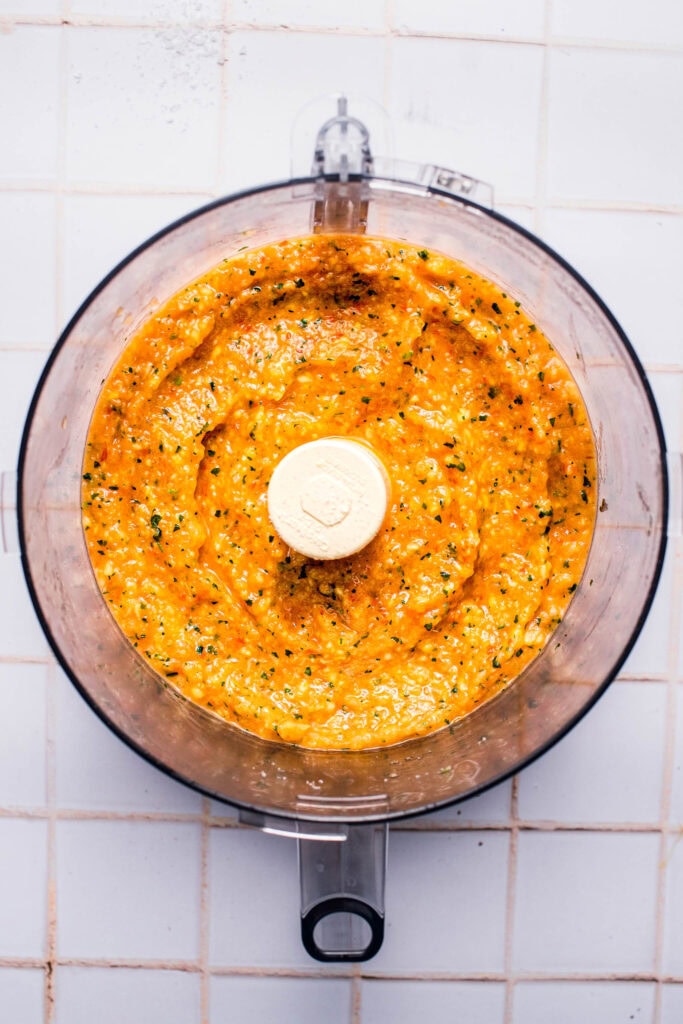 Finished mango habanero salsa in food processor bowl.