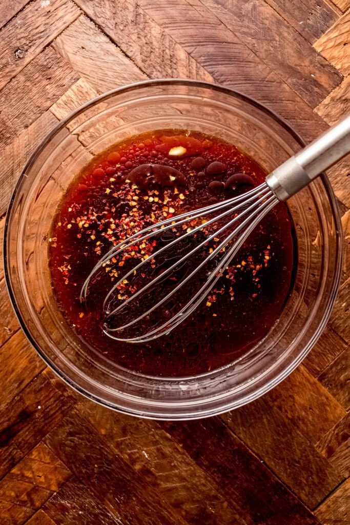 Asian-style flank steak marinade being whisked together.