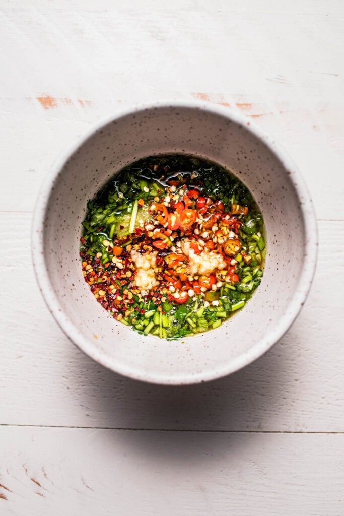 Ingredients for crying tiger sauce in bowl before mixing.