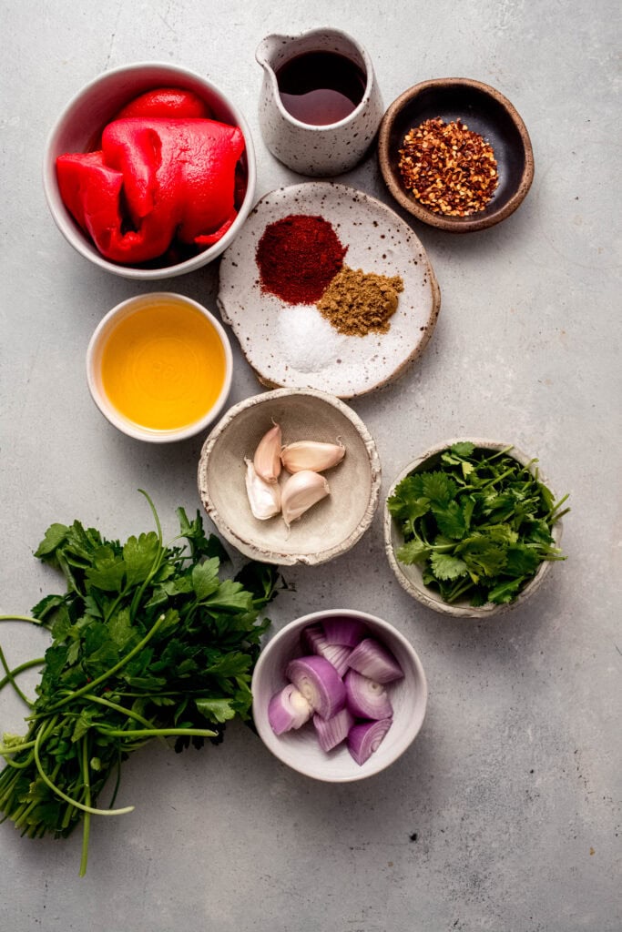 Ingredients for red chimichurri on counter.