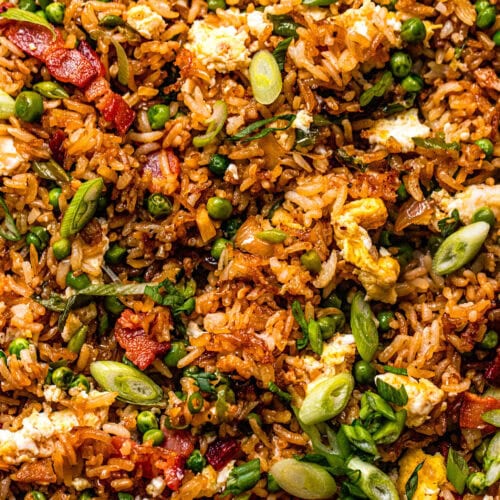Overhead close up of fried rice topped with green onions.