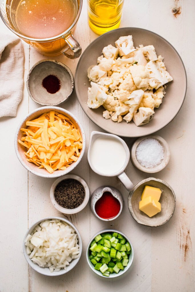 Ingredients for buffalo cauliflower soup on counter.