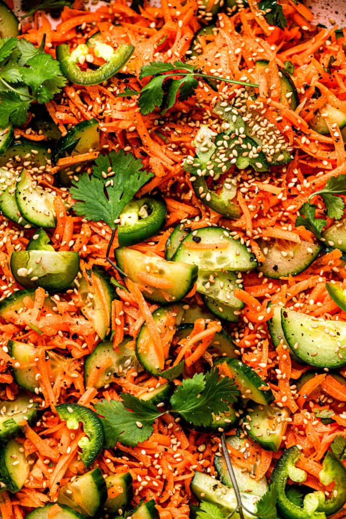 Overhead close up of prepared carrot cucumber salad.