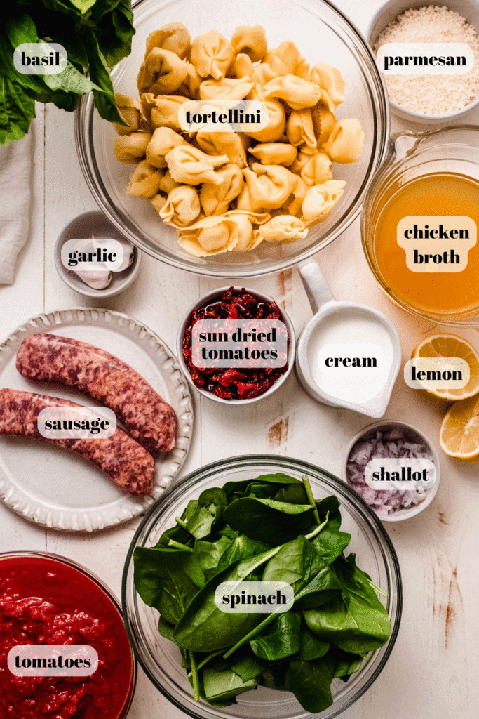 Ingredients for marry me tortellini labeled on counter.