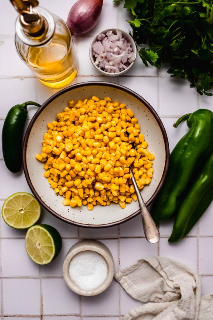 Ingredients for chipotle corn salsa on counter.